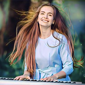 Natalie smiling at the piano.